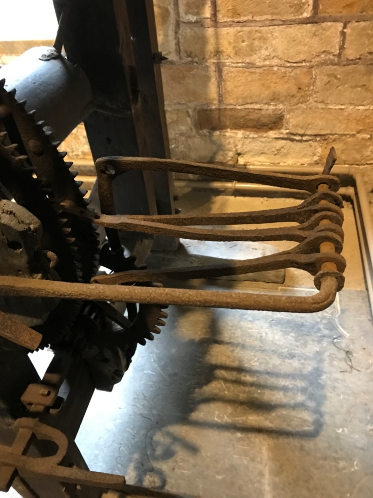A close-up of the four levers which rang the bells